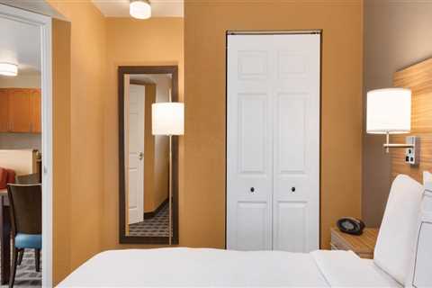 What is the Minimum Age Requirement for Staying at Suites in Denver, Colorado?